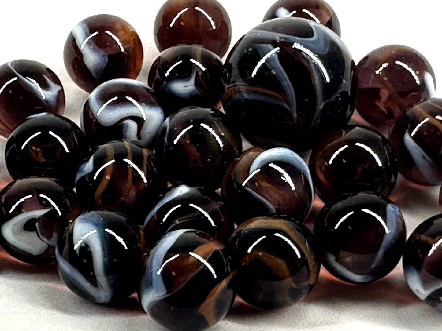 25 Glass Marbles ROCKET Brown/White Transparent Taw Mib Shooter
